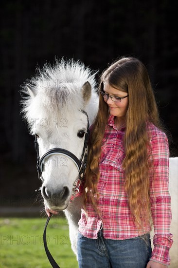 Girl with a pony