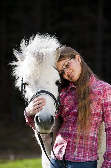 Girl with a pony