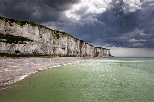 Storm clouds over chalk cliffs on the coast near Saint-Valery-en-Caux