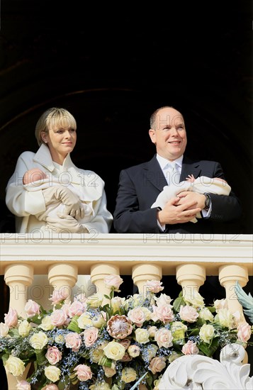 Princess Charlene and Prince Albert II of Monaco presenting their twins Prince Jacques and Princess Gabrielle at the palace window to the public for the first time