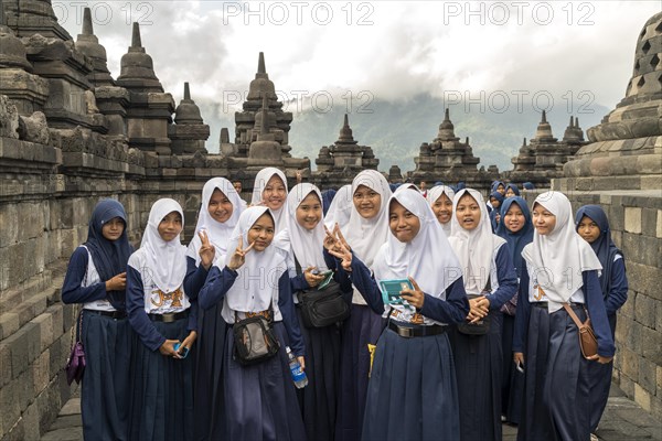 Muslim schoolgirl in uniform with headscarf