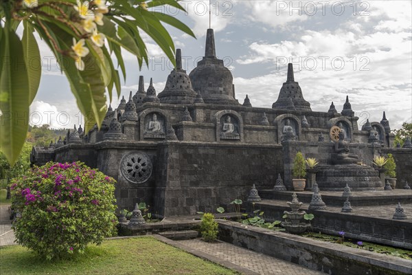 Stupas and statues in the Buddhist temple Brahma Vihara Ashrama