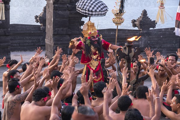 Dancers performing the classic Balinese Kecak Dance in Uluwatu Temple