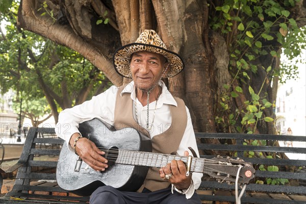 Street musician with guitar