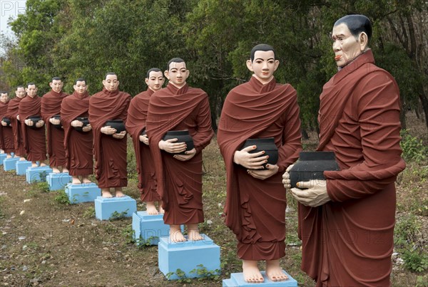 Row of statues of the 500 Arahant followers of Buddha at Win Sein Taw Ya