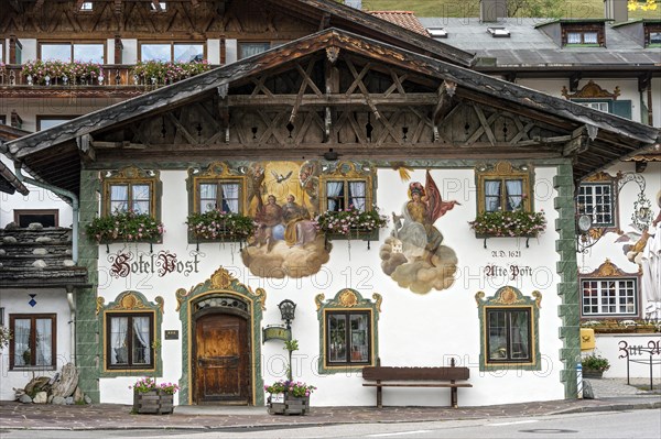 Luftlmalerei mural of the Holy Trinity and St. Florian