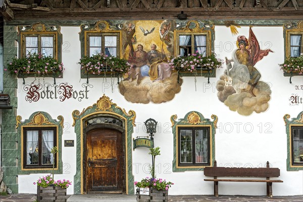 Luftlmalerei mural of the Holy Trinity and St. Florian