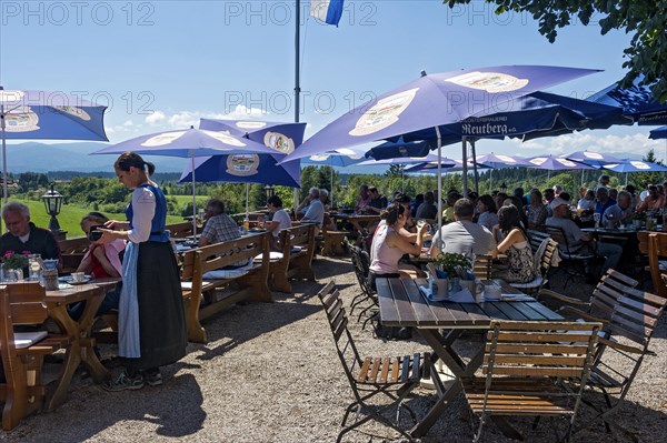 Visitors in the beer garden of Reutberg abbey