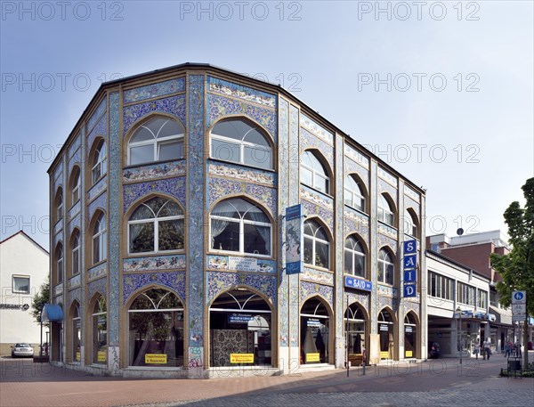 Commercial building with Oriental facade decorations