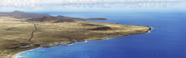 View from Mirador de El Risco de Famara to village Caleta de Famara