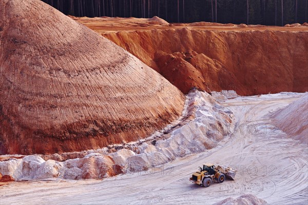 Excavator in kaolin pit