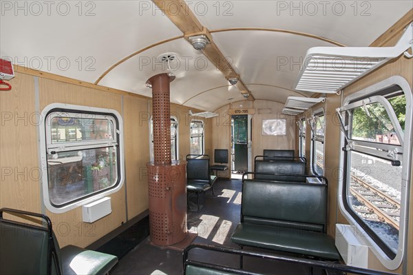 Wooden oven in train compartment