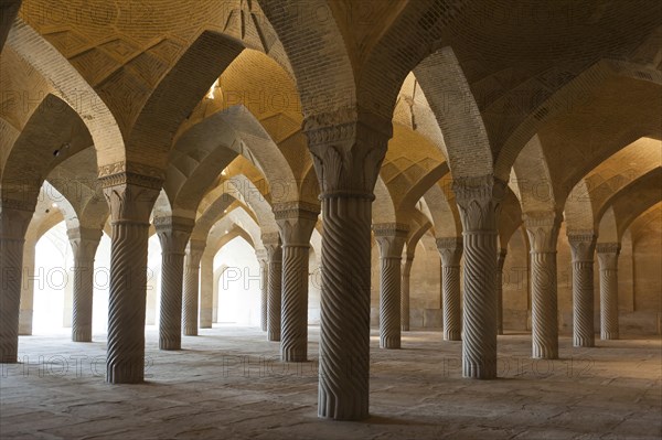 Decorated pillars in the prayer hall of the mosque Wakil also Vakil Mosque or Masjid-e Vakil