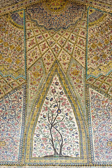 Wall with intricately painted tiles