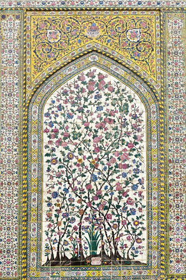 Wall with intricately painted tiles
