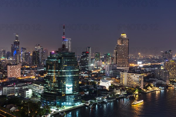 Skyline with CAT Telecom Tower and Lebua State Tower at night