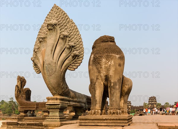 Seven-headed Naga and decapitated lion figure on the western access route