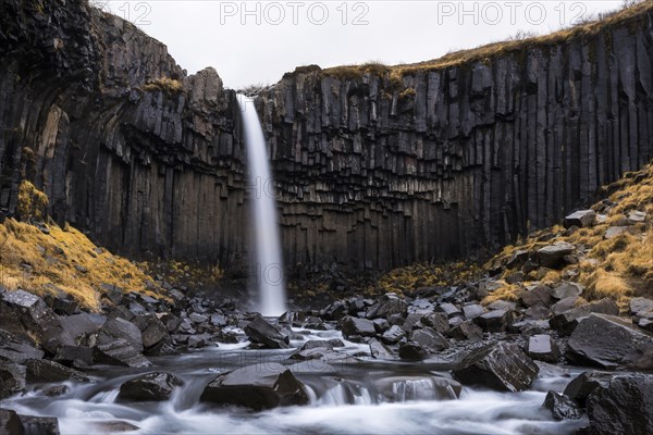 Svartifoss waterfall with river