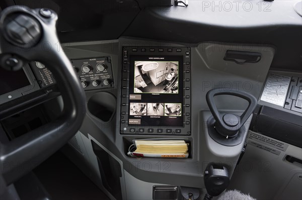 A surveillance monitor in the cockpit of a Boeing 787-9 Dreamliner of the airline ANA indicates the space in front of the armored cockpit door from different perspectives