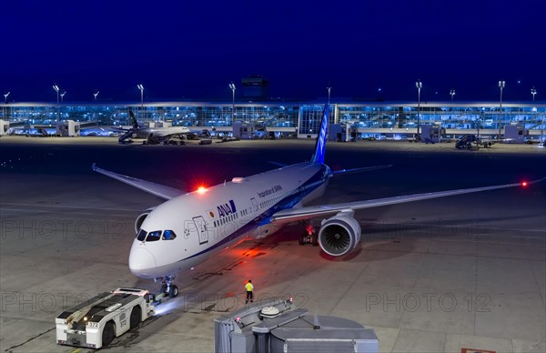 A Boeing 787-9 Dreamliner of the airline ANA at Terminal 2 at Munich Airport