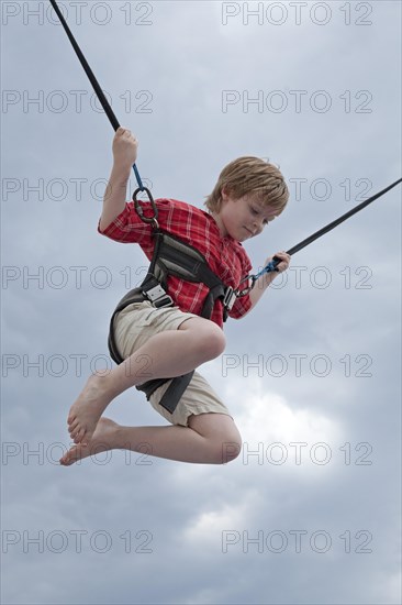 Boy on trampoline