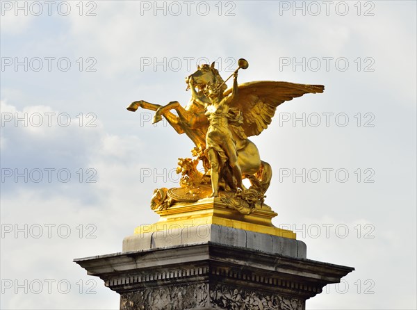 Bronze statue of Pegasus on a pillar at the bridge Alexandre III