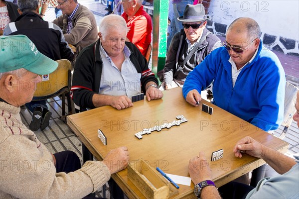 Men playing dominoes