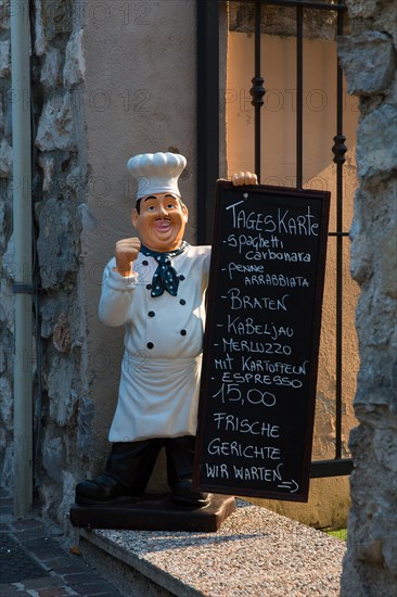 Menu of the day in front of a restaurant