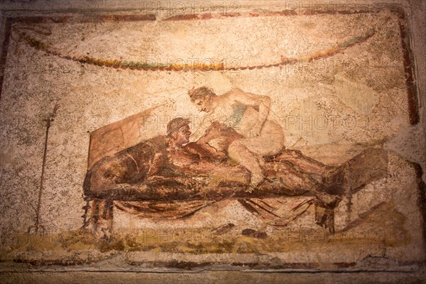 Erotic mural in the ancient brothel of Africanus