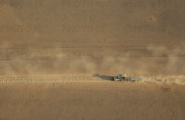 A vehicle of the balloon ground crew on a badly corrugated road