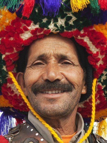 Portrait of a water seller at the Jemaa el-Fnaa square in Marrakesh