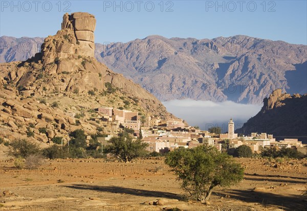 The village of Aguard Oudad at the foot of the famous rock formation Chapeau de Napoleon