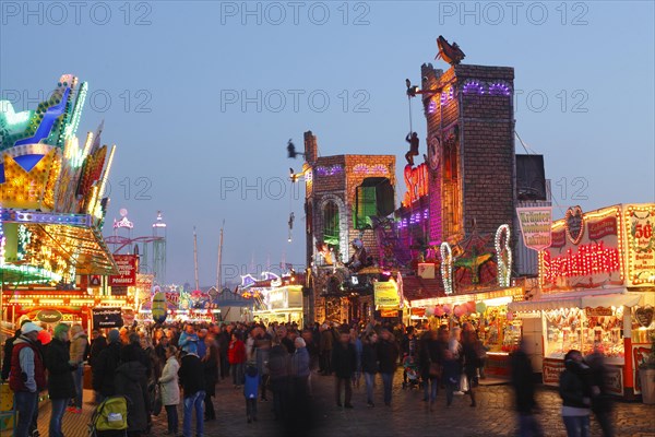 Ghost train Spuk on the fun fair Bremer Freimarkt at dusk