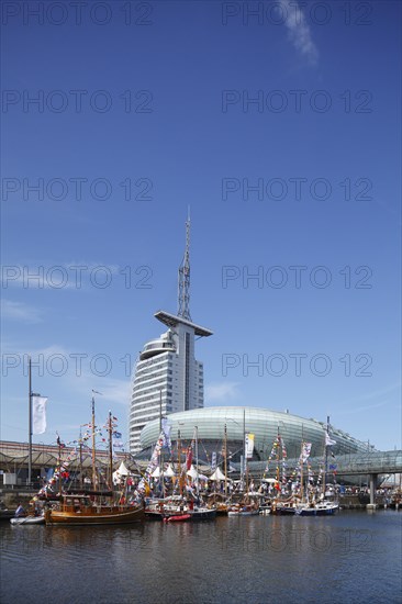 Sailboats with colorful flags