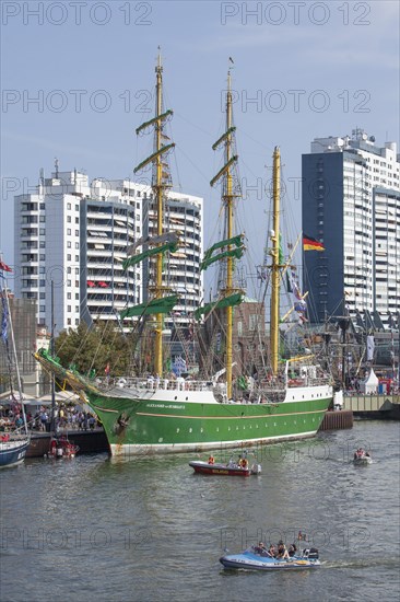 Hospitality ship Alexander von Humboldt II in the Neuer Hafen harbour with Columbus Center at the Sail 2015 festival