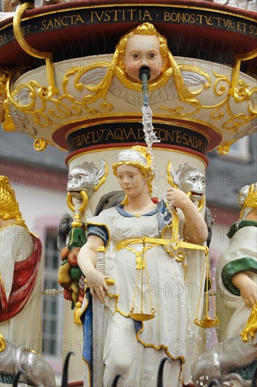 Petrusbrunnen fountain with representations of the four cardinal virtues