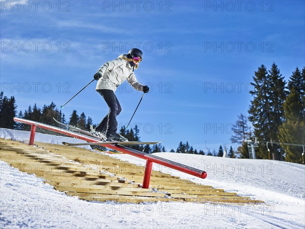 Teenage skier with twin-tips