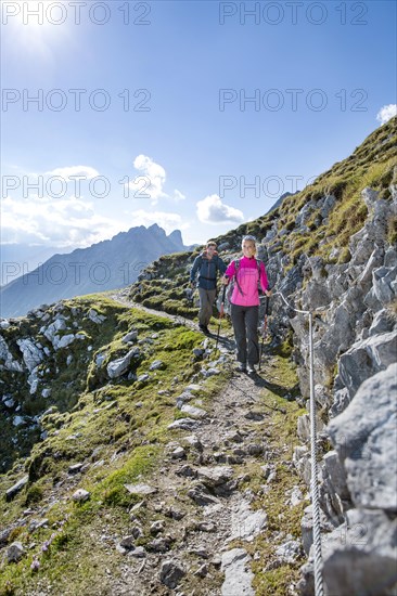 Hikers walking on Goetheweg with safety rope Goetheweg