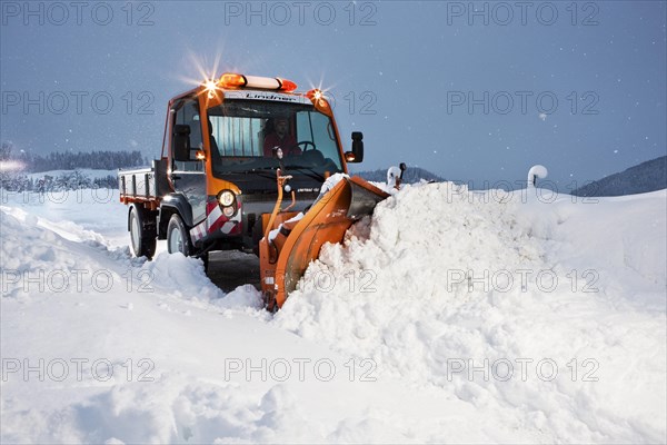 Snowplow removing snow