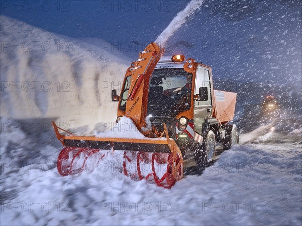 Snowplow removing snow