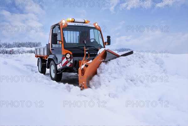 Snowplow removing snow