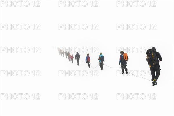 Roped party on glaciers Styggebreen