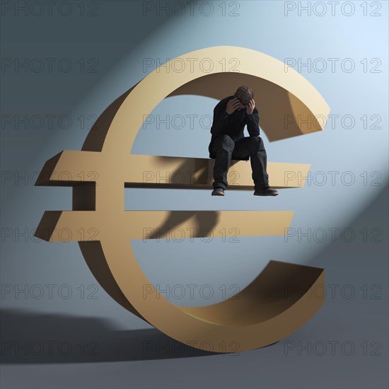 Man sitting on euro symbol