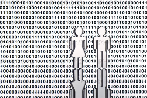 Two figures in front of binary code