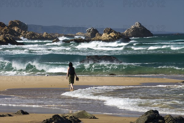 Tourist on a beach at the Indian Ocean