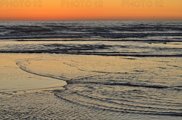 Waves at sunset on the Pacific Coast