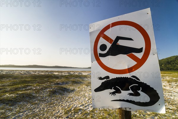 Warning sign for crocodiles and swimming ban