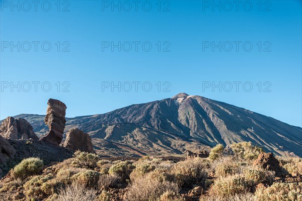 Pico del Teide or Mount Teide with the rock formation Roques de Garcia