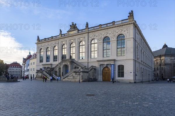 The Transport Museum on Neumarkt square at dusk