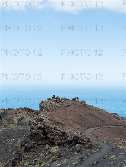 Hiking trail through a lava landscape